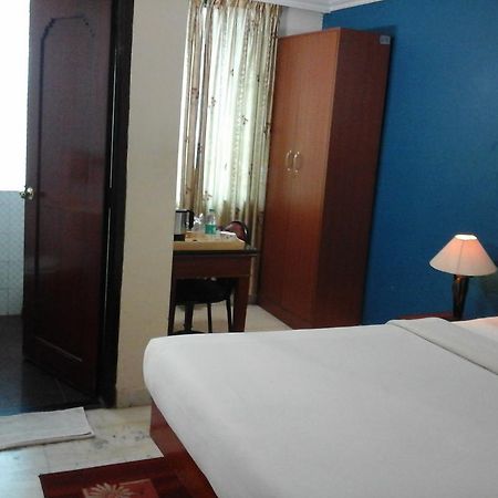 Hotel Pigeon International Bangalore Buitenkant foto