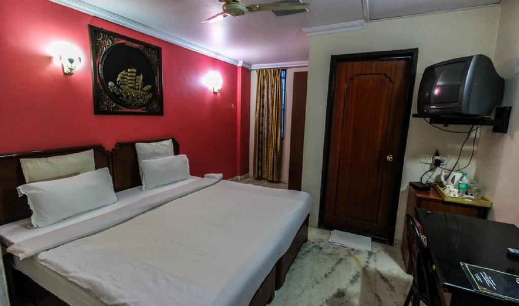 Hotel Pigeon International Bangalore Kamer foto