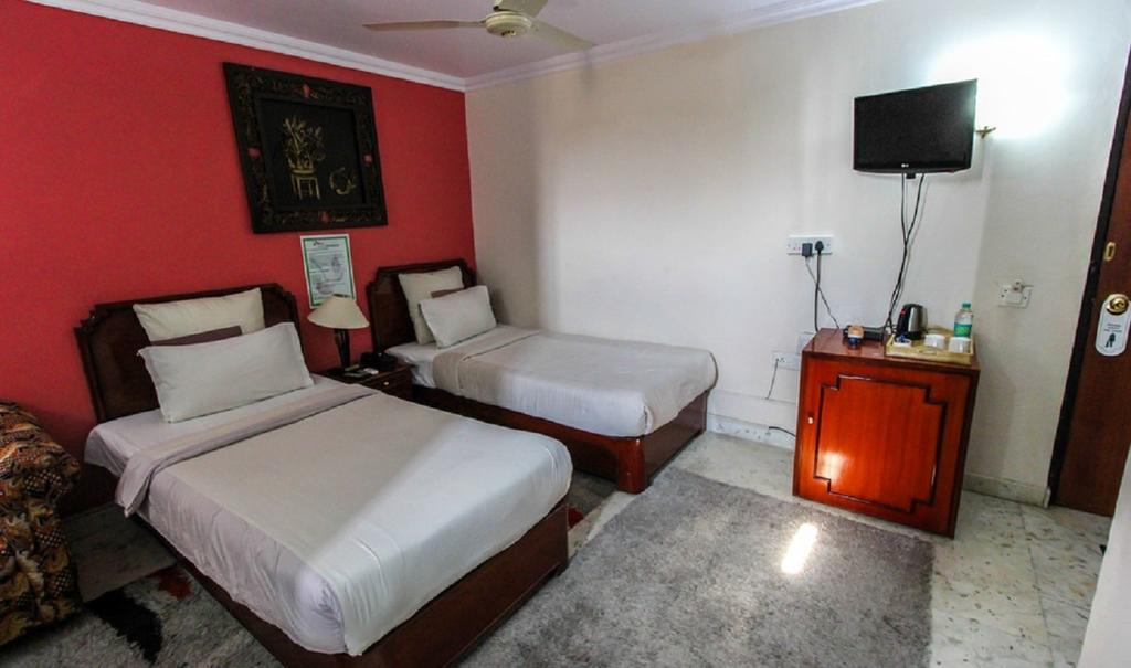 Hotel Pigeon International Bangalore Kamer foto