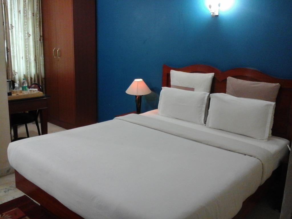 Hotel Pigeon International Bangalore Buitenkant foto